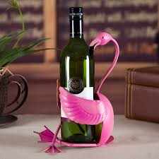 Flamingo Wine HolderExpress Global Mart  🌟 Introducing Our Exquisite Flamingo Wine Bottle Holder! 🌟
Elevate your interior décor with our charming Flamingo Sculpture, doubling up as a stylish Wine Bottle HFlamingo Wine HolderZendrop