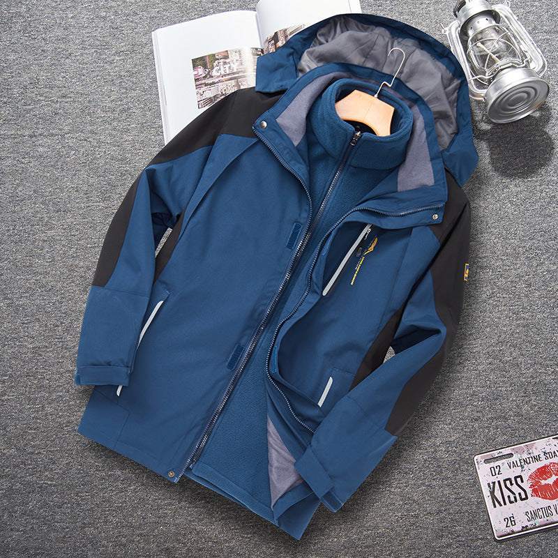 Blue men's shell jacket with detachable ski suit, featuring waterproof and windproof functionality, polar fleece lining, and non-ironing polyester fabric.