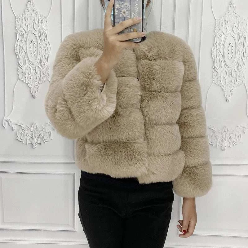 Women Faux Fur CoatExpress Global Mart  customizedProduct Description
Step into elegance and warmth with the Women Faux Fur Coat, a stylish addition to your winter wardrobe. Crafted from luxurious faux fur, this coaWomen Faux Fur CoatCartifind