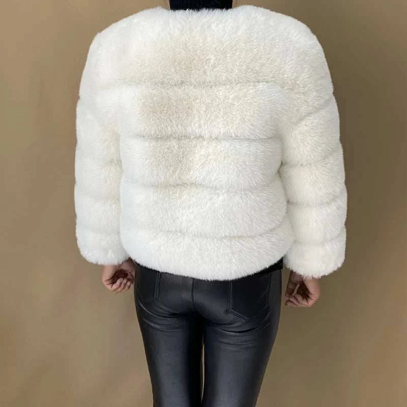 Women Faux Fur CoatExpress Global Mart  customizedProduct Description
Step into elegance and warmth with the Women Faux Fur Coat, a stylish addition to your winter wardrobe. Crafted from luxurious faux fur, this coaWomen Faux Fur CoatCartifind