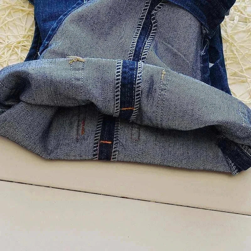 IENENS Toddler Boys' Denim Overalls Jeans Jumpsuit, durable cotton blend fabric shown up close.