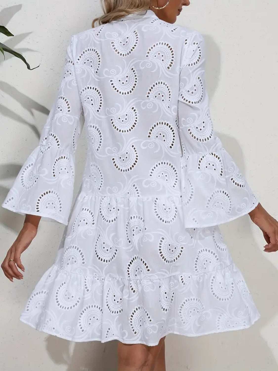 Ruffle Hem Eyelet Notched Long Sleeve DressExpress Global Mart  Features: Buttoned
Sheer: Semi-sheer
Stretch: No stretch
Body: Lined
Material composition: 100% polyester
Care instructions: Machine wash cold. Tumble dry low.
ImporRuffle Hem Eyelet Notched Long Sleeve DressTrendsi