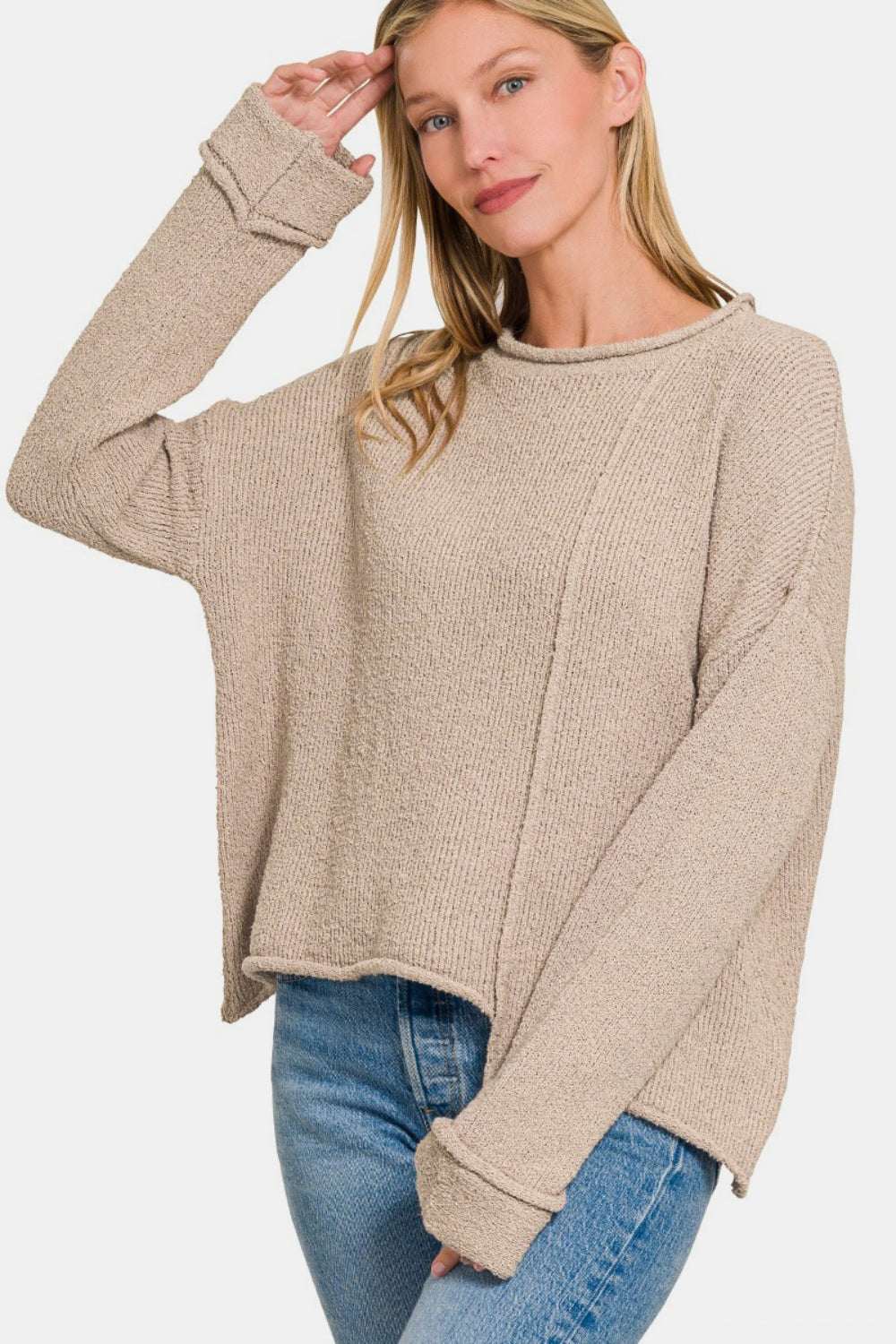 Zenana Asymmetric Hem Drop Shoulder SweaterExpress Global Mart  The Asymmetric Hem Drop Shoulder Sweater is a trendy and modern piece that offers a unique silhouette. With its drop shoulder design, this sweater exudes a relaxed aZenana Asymmetric Hem Drop Shoulder SweaterTrendsi