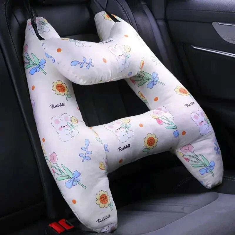 Kids car travel pillow with cute animal and floral design for neck support.