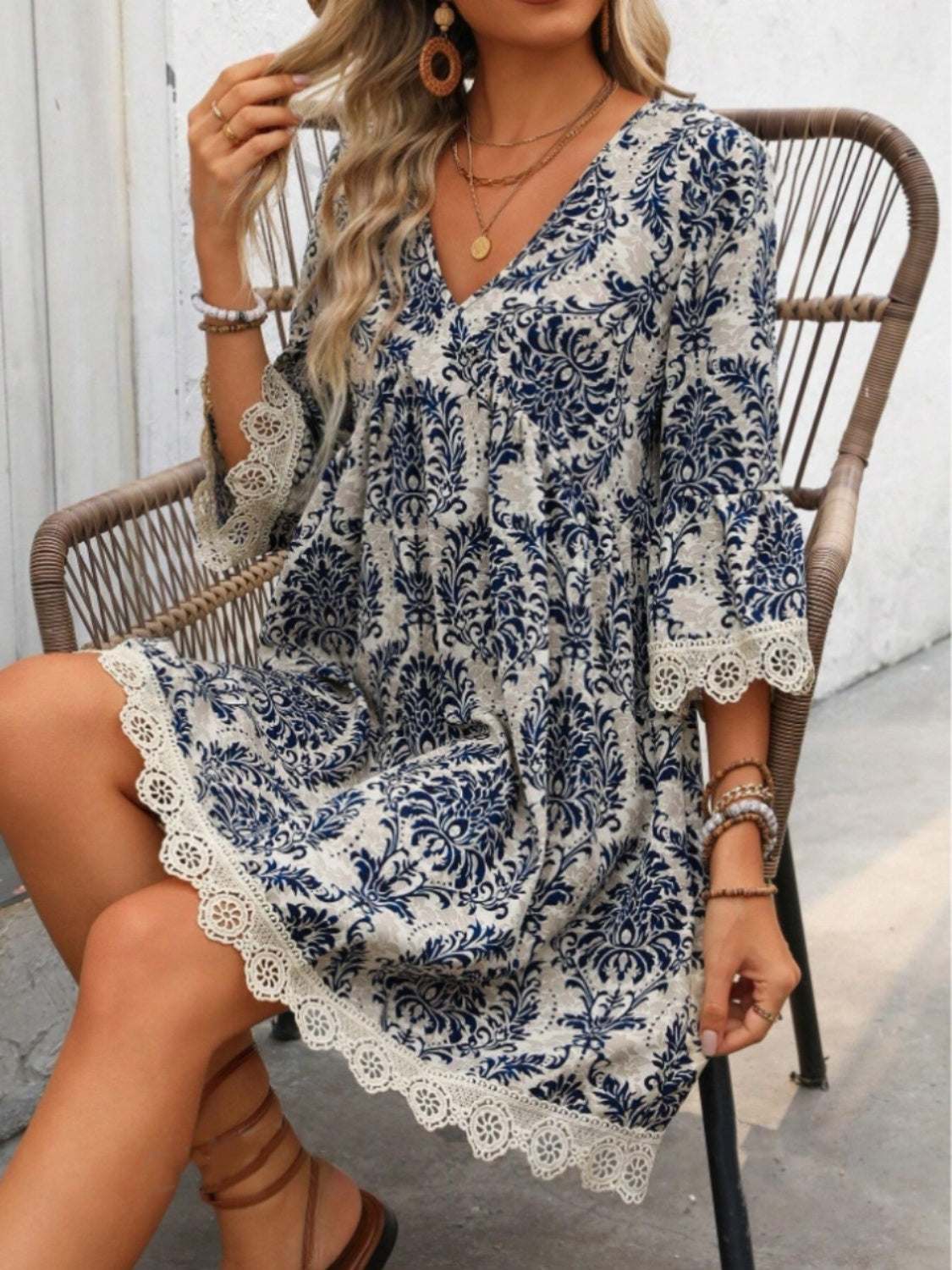 Lace Detail PrintedExpress Global Mart  Features: Lace Detail
Sheer: Opaque
Stretch: No stretch
Body: Not lined
Material composition: 100% polyester
Care instructions: Machine wash cold. Tumble dry low.
ImLace Detail Printed V-Neck Mini DressTrendsi