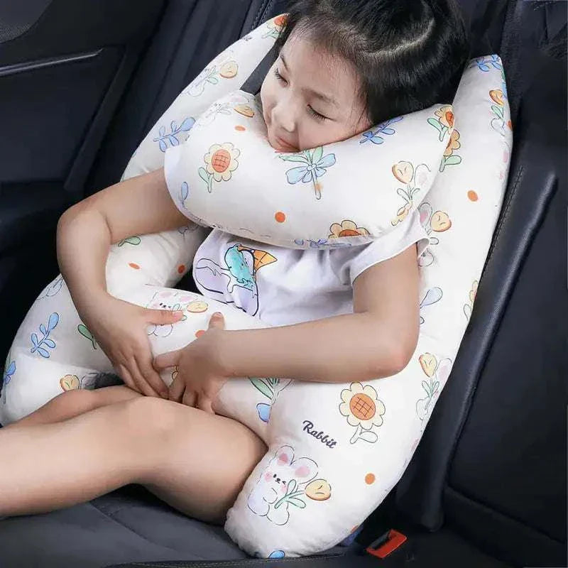 Kids car travel pillow providing neck support and comfort in a car seat.