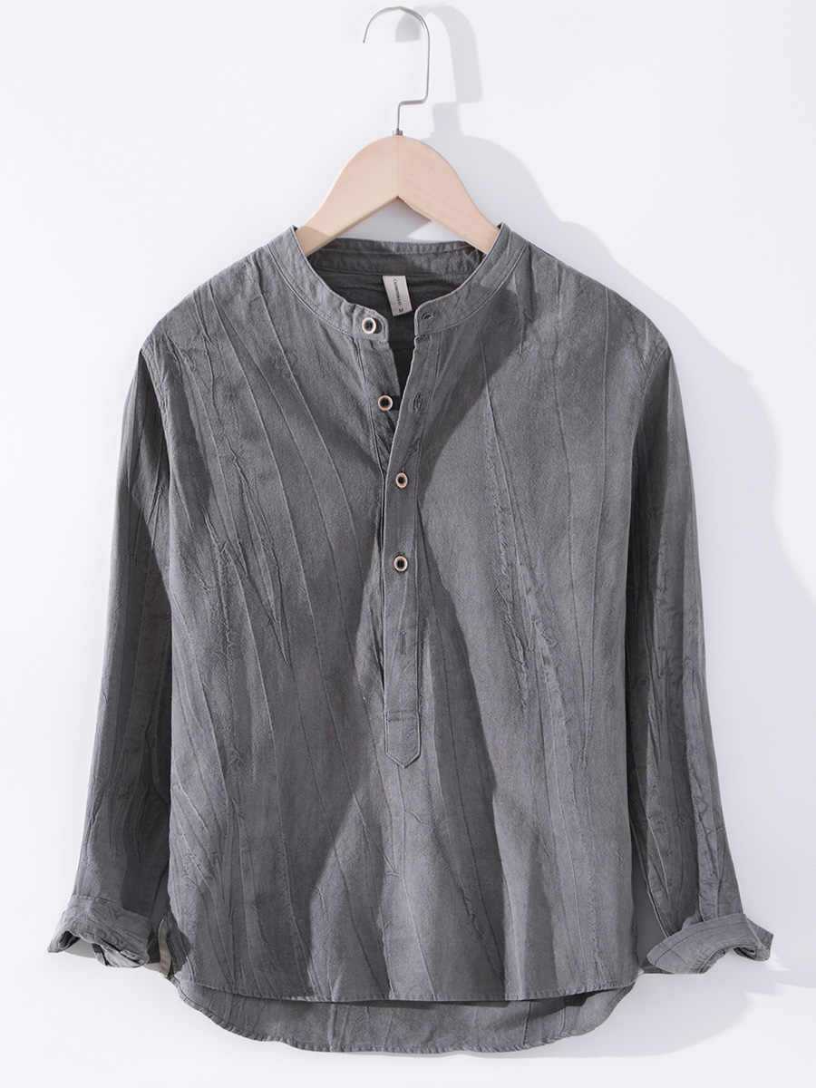 Linen shirt long sleeved stand up collar retro Japanese style in dark grey.