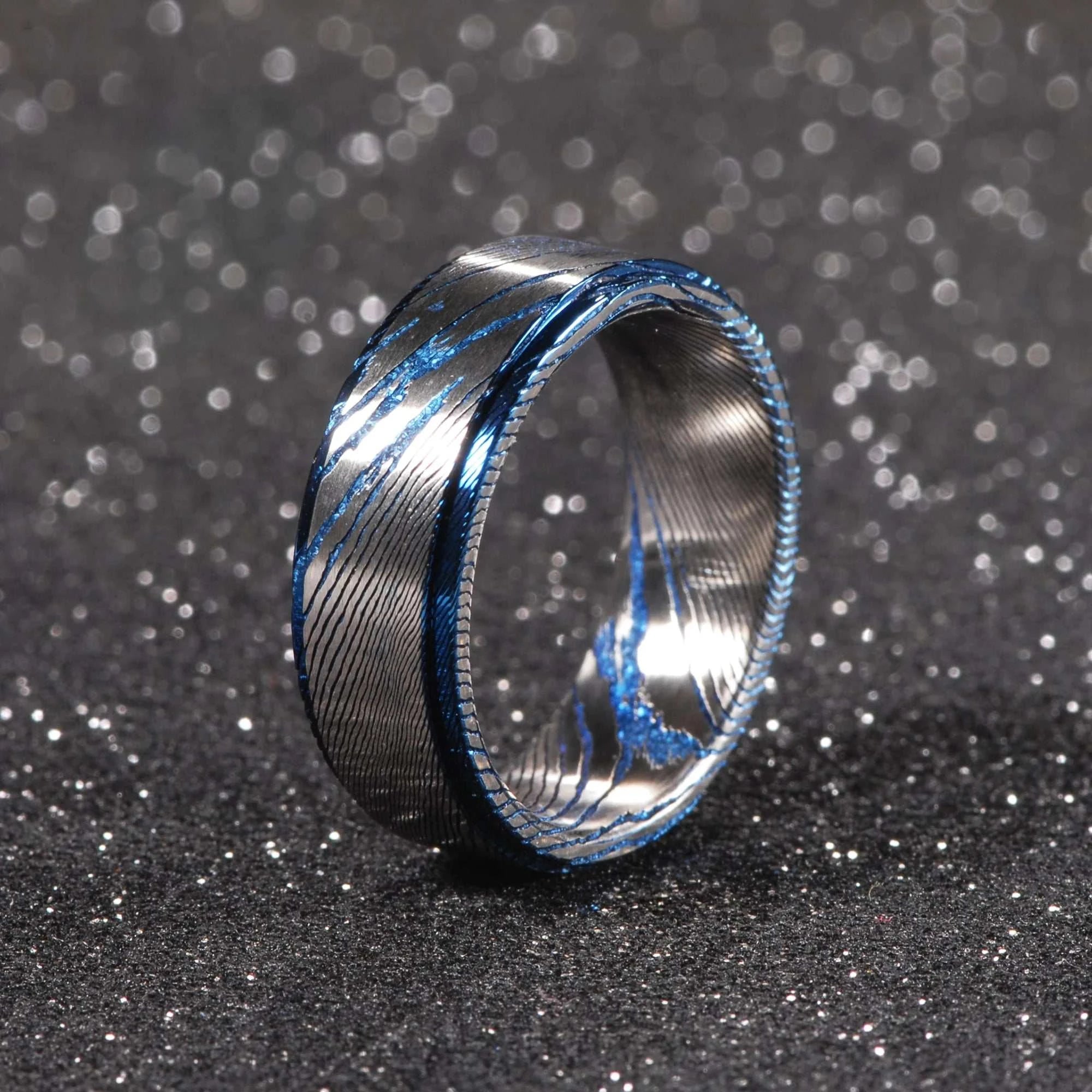 Blue Plated Damascus Steel Wedding BandExpress Global Mart  wedding_engagement_jewelrySurface Width:8mmRings Type:Wedding BandsShape\pattern:RoundStyle:ClassicOccasion:WEDDINGMaterial:MetalMetals Type:NoneGender:MenOrigin:Mainland ChinaCN:GuangdongIteBlue Plated Damascus Steel Wedding Band for Men and WomenExpress Global Mart