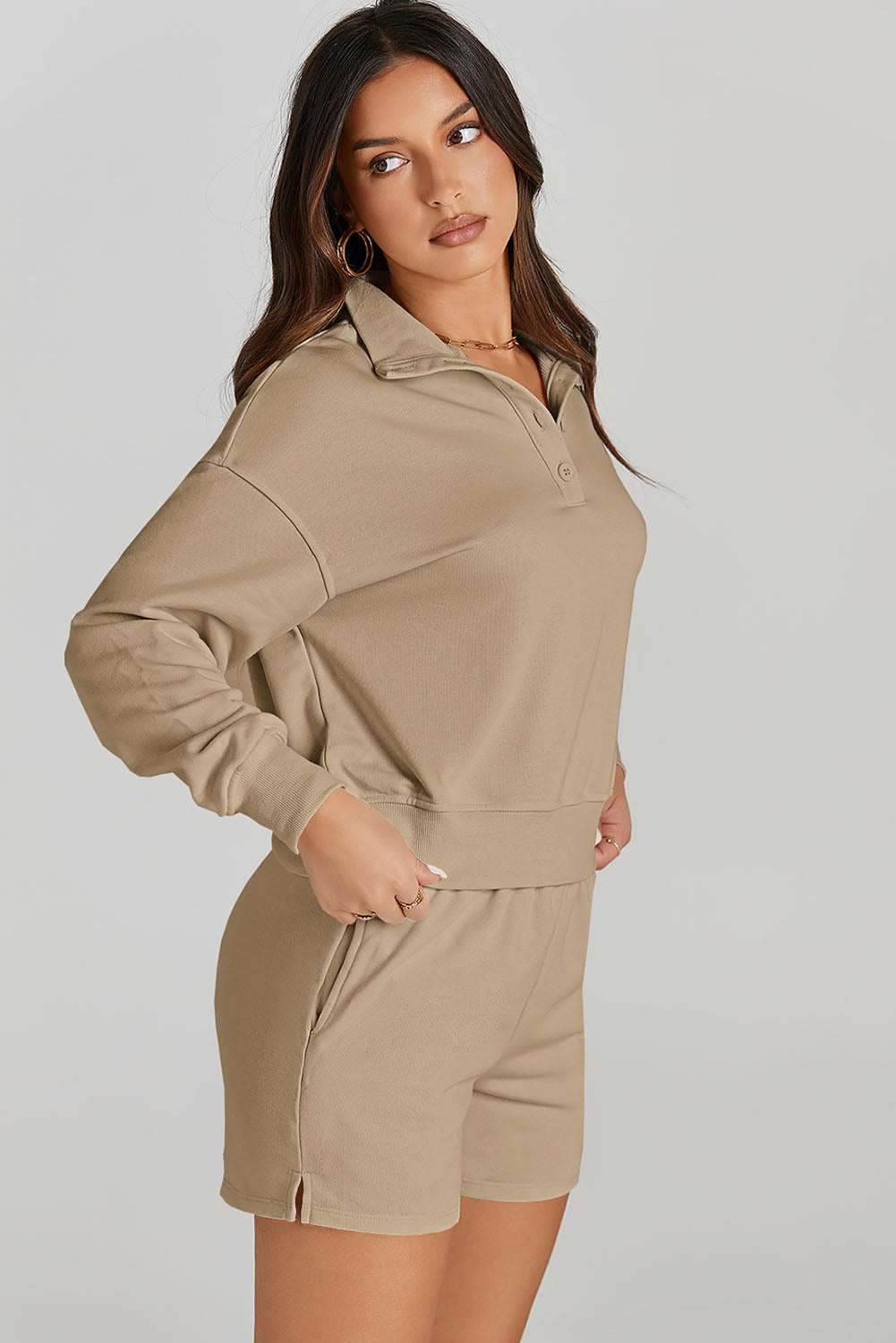 Half Button SweatshirtExpress Global Mart  Features: Pocketed
Number of pieces: Two-piece
Stretch: Slightly stretchy
Material composition: 65% polyester, 35% rayon
Care instructions: Machine wash cold. TumbleHalf Button Sweatshirt and Shorts Active SetTrendsi