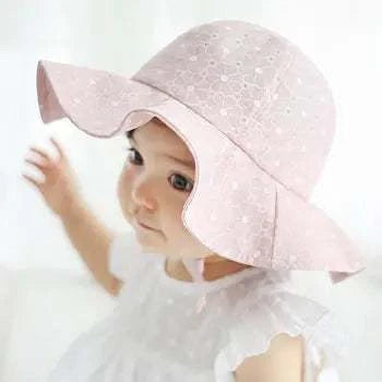 Toddler wearing a pink Lovely Toddler Kids Hat with full ear coverage and soft-touch material.