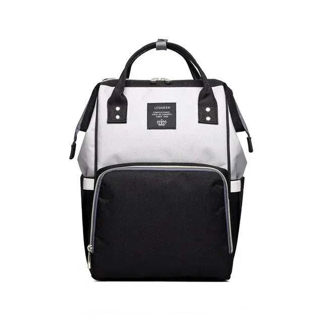 Fashion Maternity Nappy Bag with spacious compartments and stylish design, featuring durable materials and padded shoulder straps.