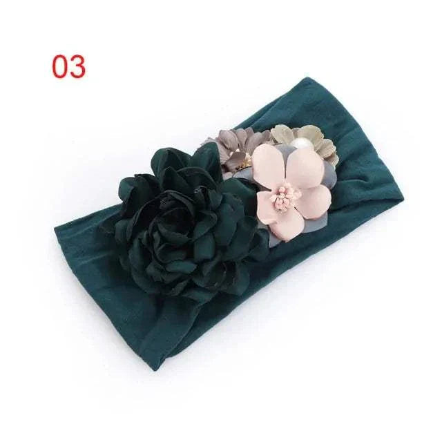 Toddler bow hairband with 3D flower in teal; soft elastic, perfect for girls' accessories.