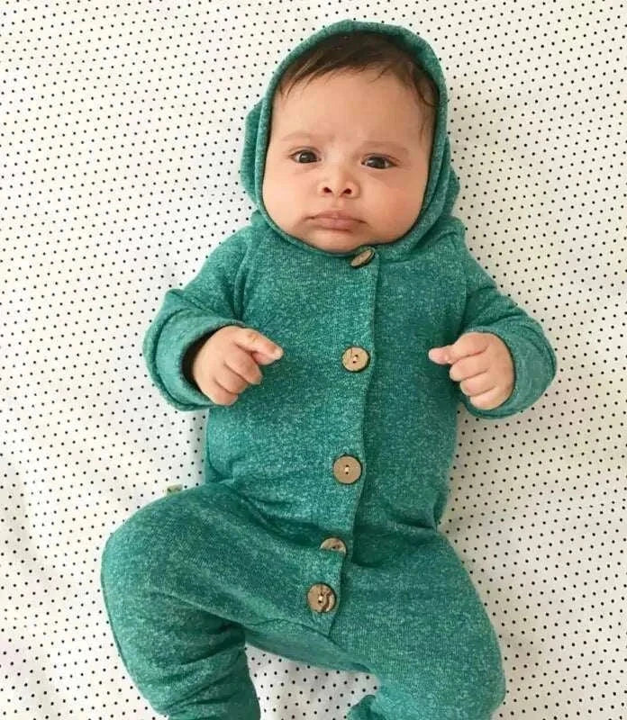 Baby wearing a green hooded romper with button closure, perfect for ages 0-24 months.