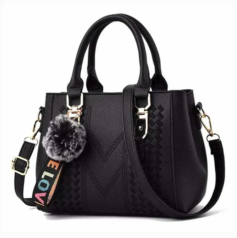 Embroidery Leather HandbagExpress Global Mart  Product Description
Introducing the Embroidery Leather Handbag, a perfect blend of elegance and practicality. This stylish satchel is designed for the modern woman wEmbroidery Leather HandbagDSers