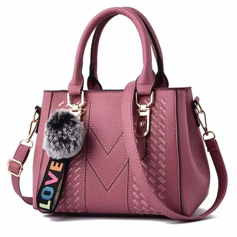 Embroidery Leather HandbagExpress Global Mart  Product Description
Introducing the Embroidery Leather Handbag, a perfect blend of elegance and practicality. This stylish satchel is designed for the modern woman wEmbroidery Leather HandbagDSers