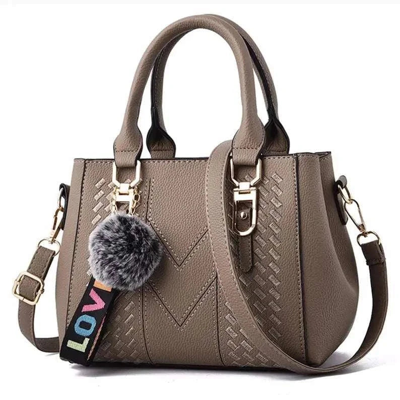 Embroidery Leather HandbagExpress Global Mart  Product Description
Introducing the Embroidery Leather Handbag, a perfect blend of elegance and practicality. This stylish satchel is designed for the modern woman wEmbroidery Leather HandbagDSers