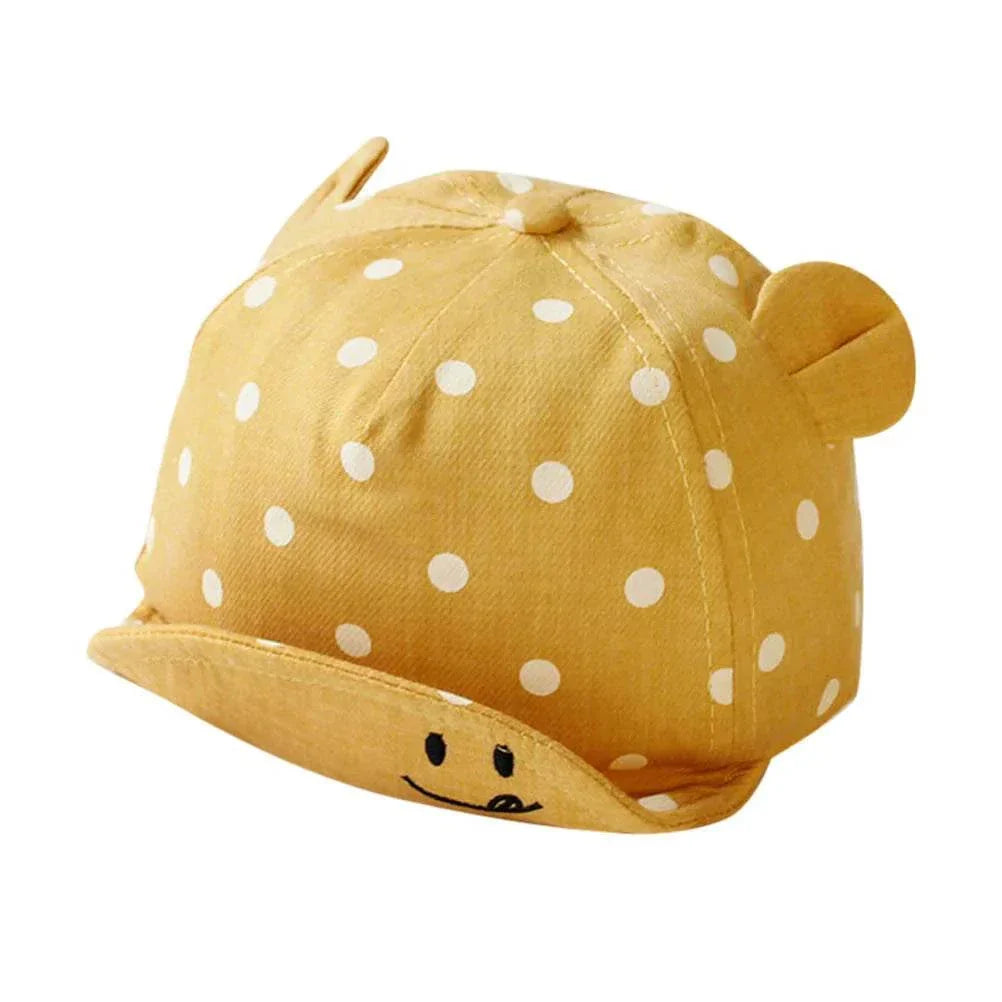 Toddler sun hat with cute dots and ear coverage for UV protection.