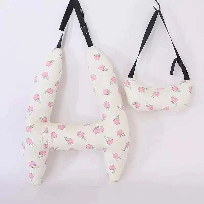 Kids car travel pillow with ice cream print design for neck support.