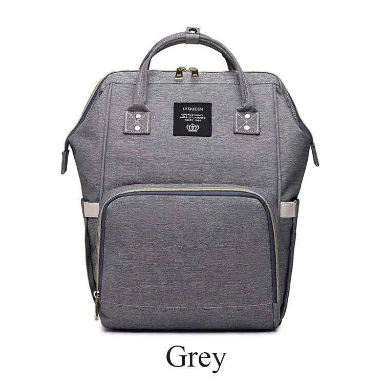 Fashion maternity nappy bag in grey with multiple compartments and stylish design.