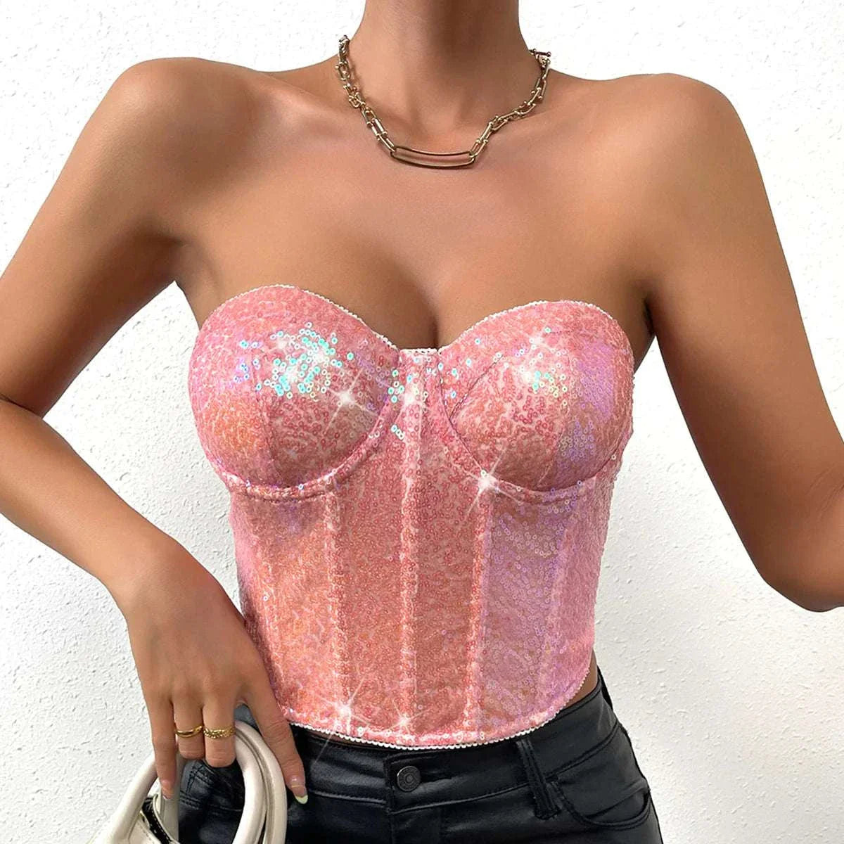 Glitter tank top for women in pink sequin, slim fit style.