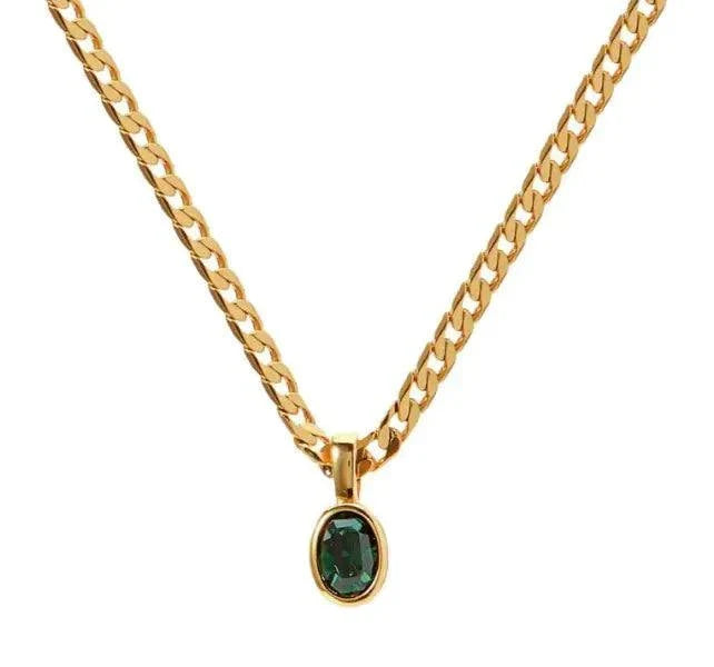 Crystal Stone Pendant Necklace with green oval crystal on gold chain.