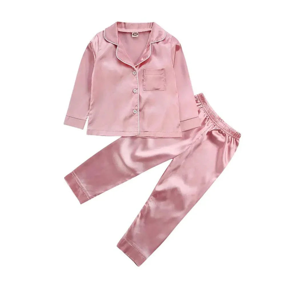 Pink silk satin toddler pajamas set for ultimate comfort and style.