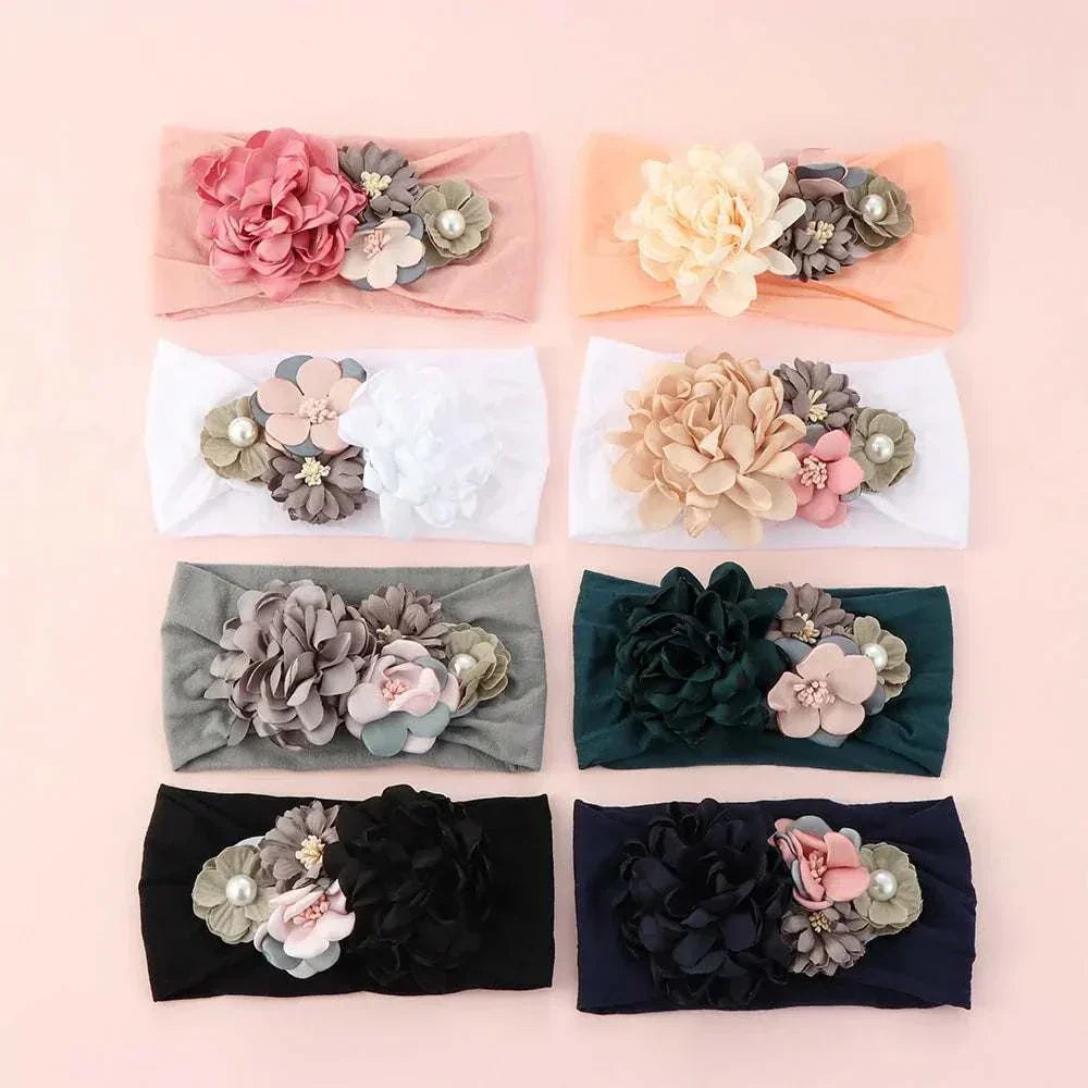 Toddler girls' bow hairbands with 3D flower, available in various colors, perfect for babies and kids.