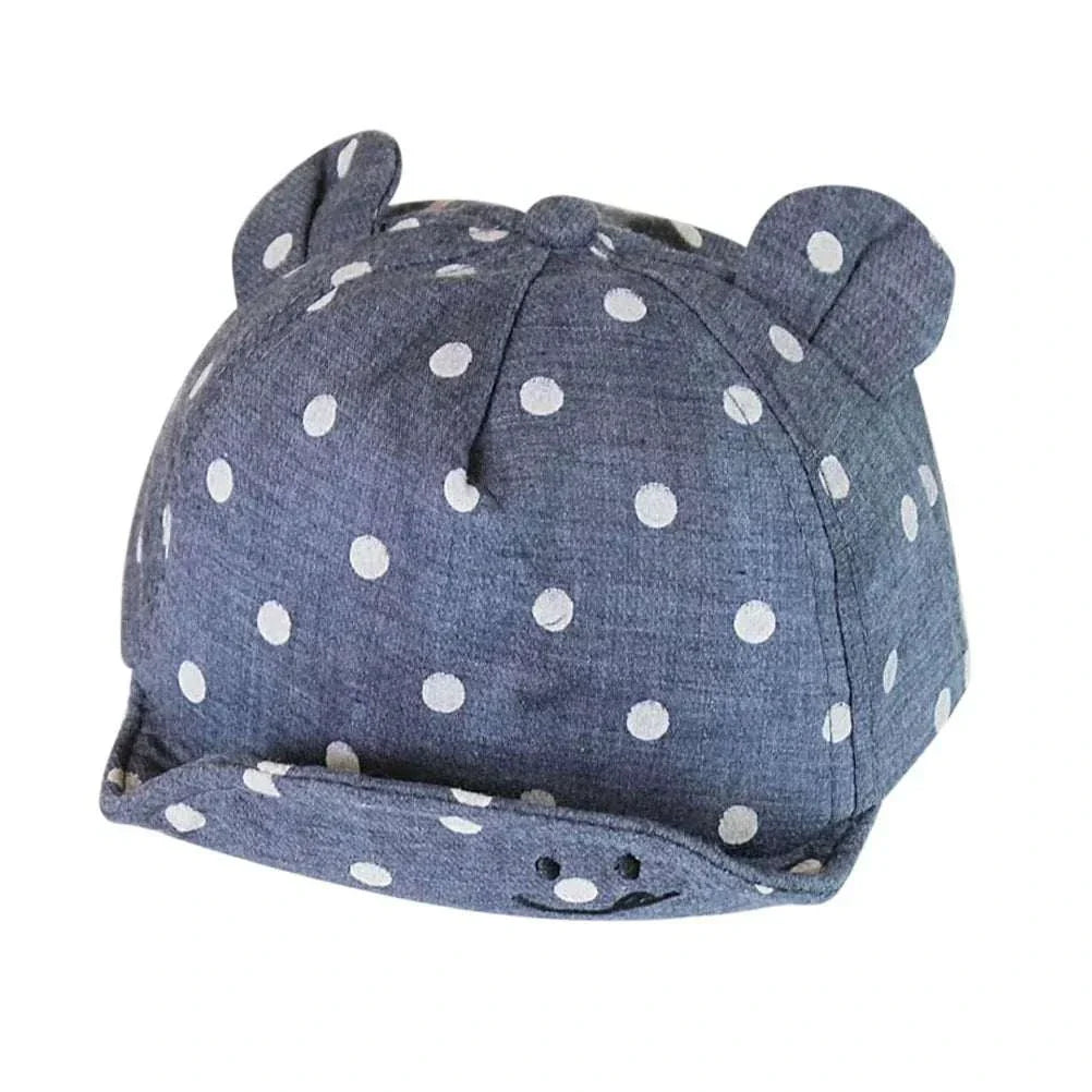 Toddler sun hat with cute dots and ear coverage for UV protection.