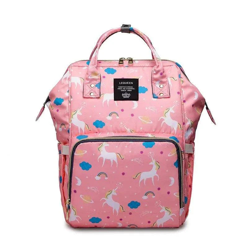 Fashion maternity nappy bag with pink unicorn design and spacious compartments.