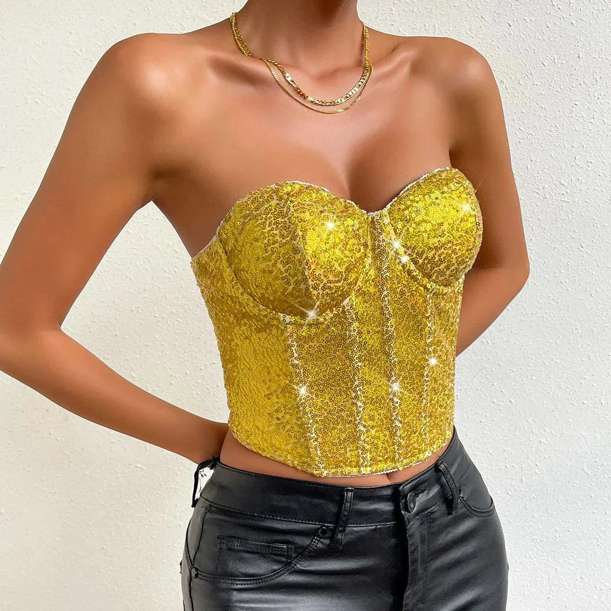 Glitter tank top for women in yellow sequin design, slim fit style, perfect for parties or special occasions.