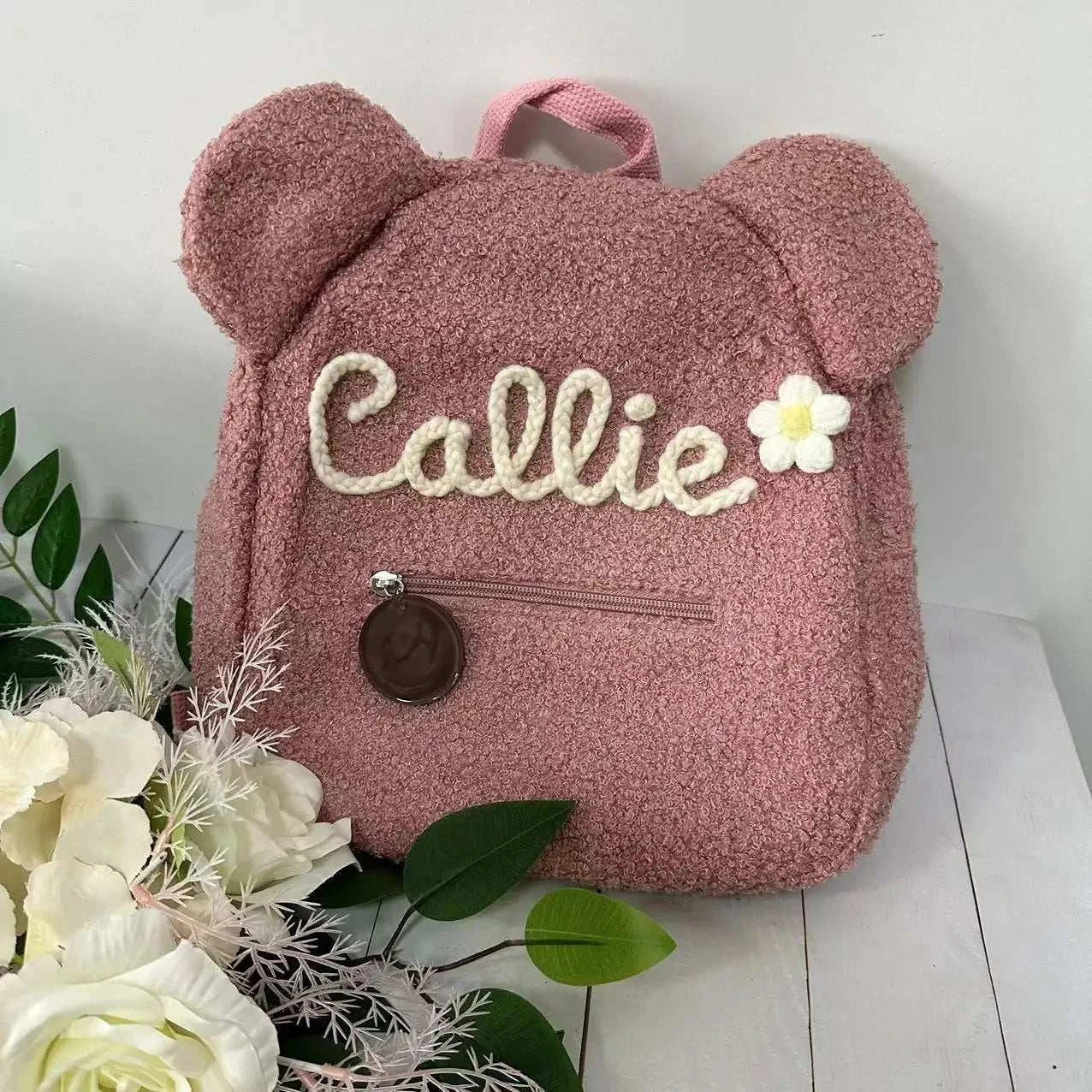 Personalized Hand-Embroidered Teddy Bear Backpack CustomExpress Global Mart  customizedPlace Of Origin:China (mainland)Technics:jacquardHandle/Strap Type:soft handleStyle:CasualExterior:Silt PocketCarrying System:Arcuate Shoulder StrapRain Cover:NoCapaPersonalized Hand-Embroidered Teddy Bear Backpack Custom Name Portableb0d141-b8