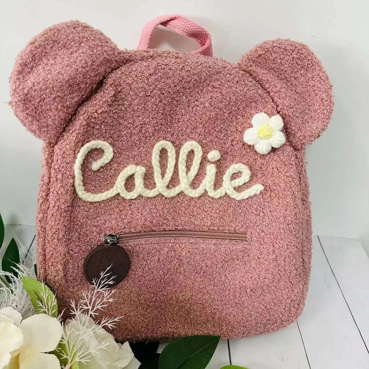 Personalized Hand-Embroidered Teddy Bear Backpack CustomExpress Global Mart  customizedPlace Of Origin:China (mainland)Technics:jacquardHandle/Strap Type:soft handleStyle:CasualExterior:Silt PocketCarrying System:Arcuate Shoulder StrapRain Cover:NoCapaPersonalized Hand-Embroidered Teddy Bear Backpack Custom Name Portableb0d141-b8