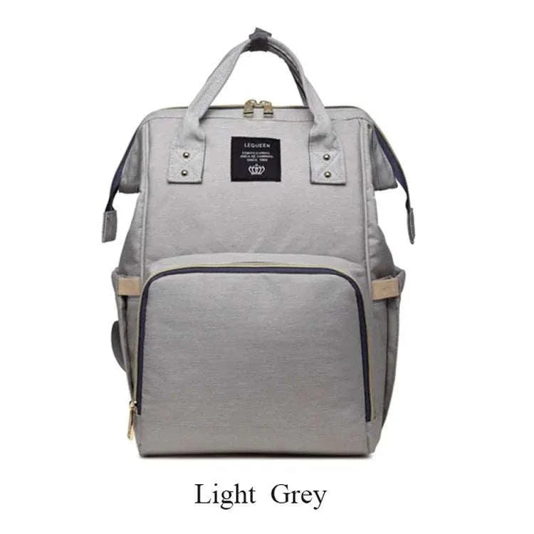 Light grey fashion maternity nappy bag with spacious compartments and stylish design.