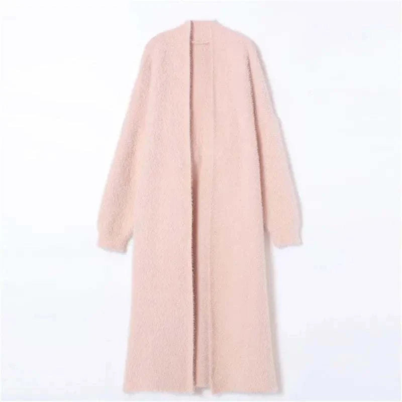 Knee Length Cardigan CoatExpress Global Mart  Product Description
The Knee Length Cardigan Coat offers the perfect blend of style and warmth for the autumn and winter seasons. Crafted from a premium cotton and pKnee Length Cardigan CoatDSers