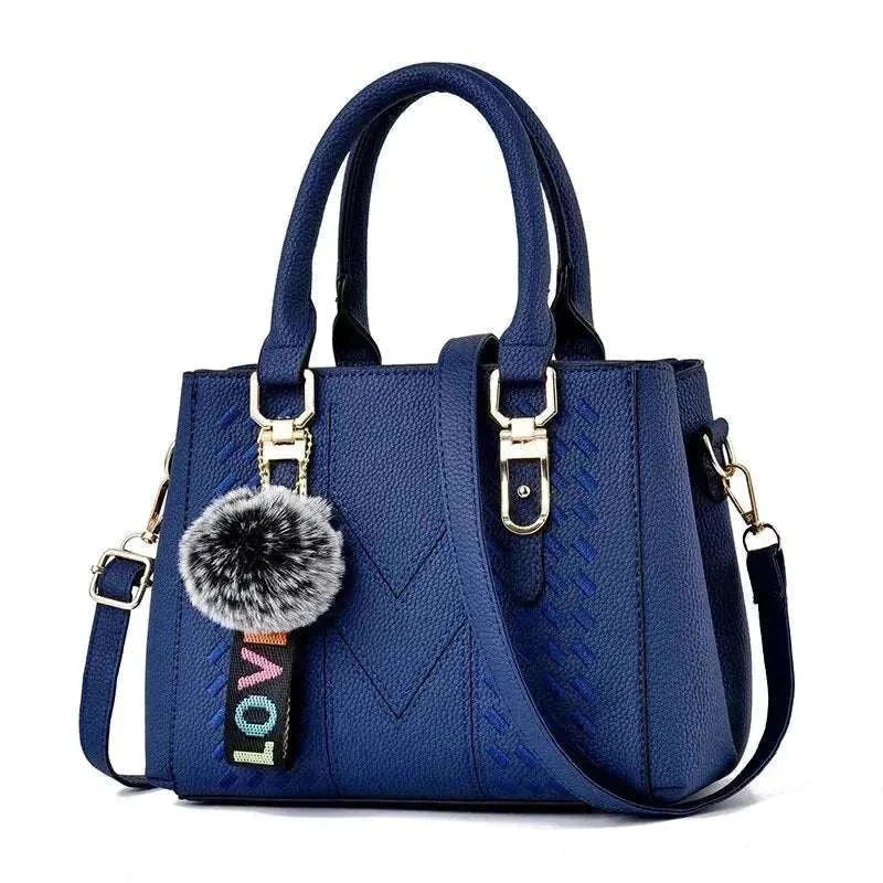 Embroidery messenger bag for women, bucket shape, perfect for everyday use.