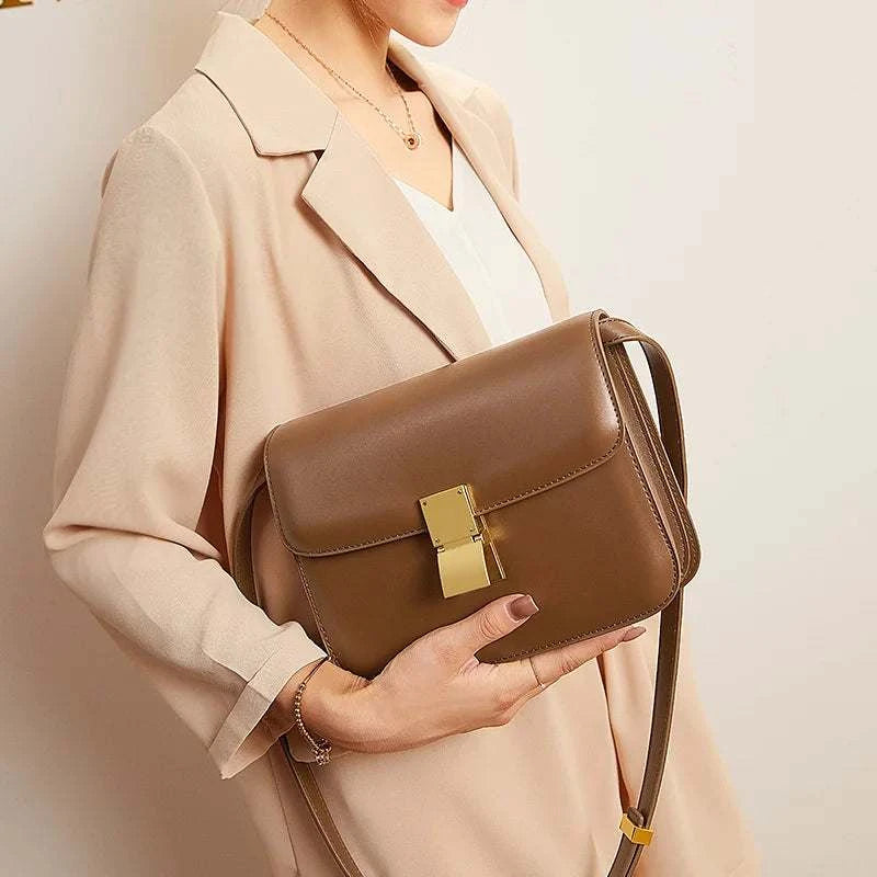 Genuine Leather Square Shoulder BagExpress Global Mart  Product Description
Introducing the Genuine Leather Square Shoulder Bag, a stunning accessory designed for the modern woman who values style and functionality. This Genuine Leather Square Shoulder BagDSers