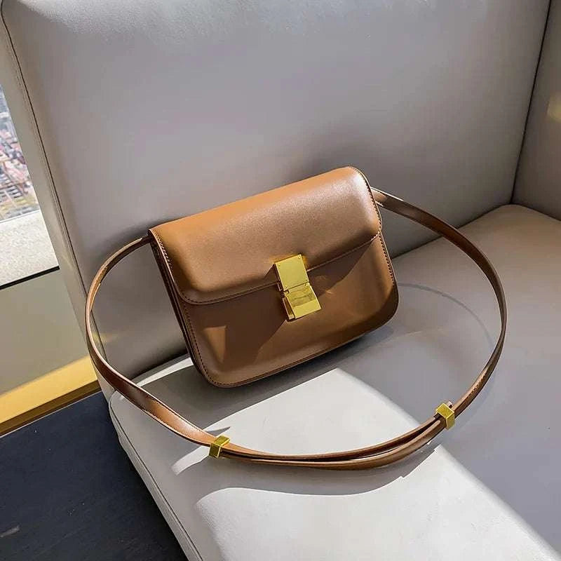 Genuine Leather Square Shoulder BagExpress Global Mart  Product Description
Introducing the Genuine Leather Square Shoulder Bag, a stunning accessory designed for the modern woman who values style and functionality. This Genuine Leather Square Shoulder BagDSers