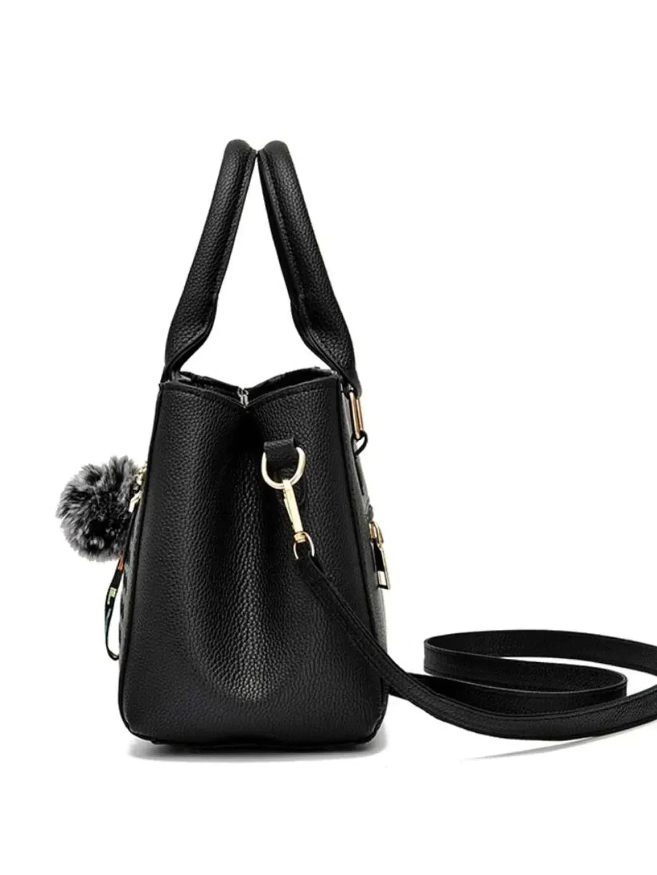 Embroidery messenger bag for women, black bucket shape with long strap, perfect for everyday use.