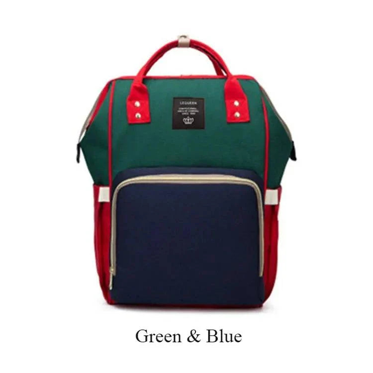 Fashion Maternity Nappy Bag in green and blue with spacious compartments and insulated pockets.