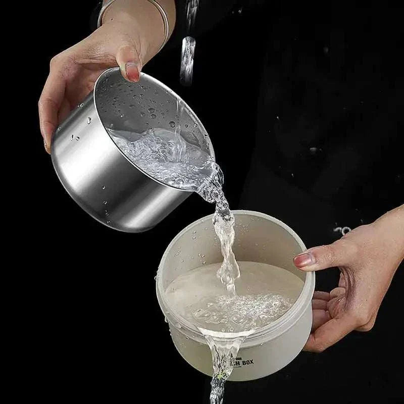 Pouring water into a bento lunch box set container.