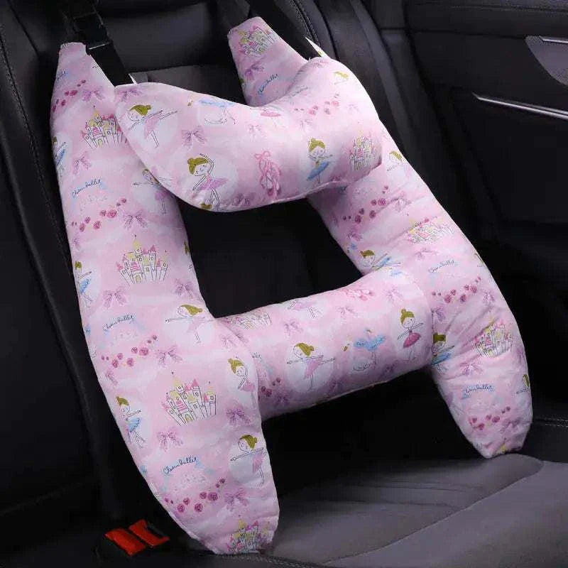 Kids car travel pillow with ergonomic design for neck support and comfort in a car seat.