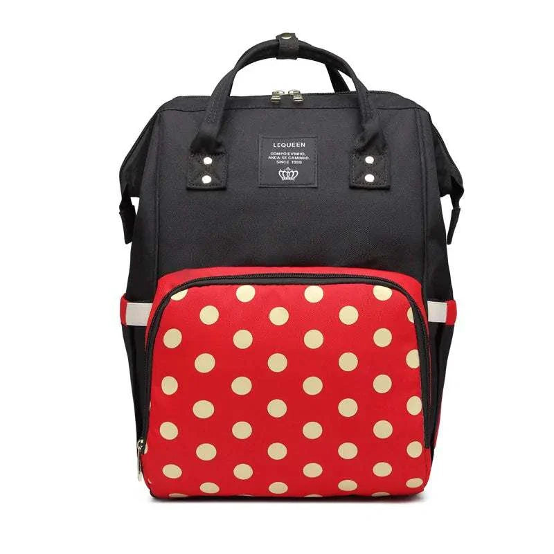 Fashion Maternity Nappy Bag with red polka dot design, spacious compartments, and water-resistant material.