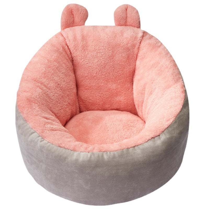 Warming soft dog bed with cushioned sleeping bag design, pink interior and gray exterior, suitable for puppies.