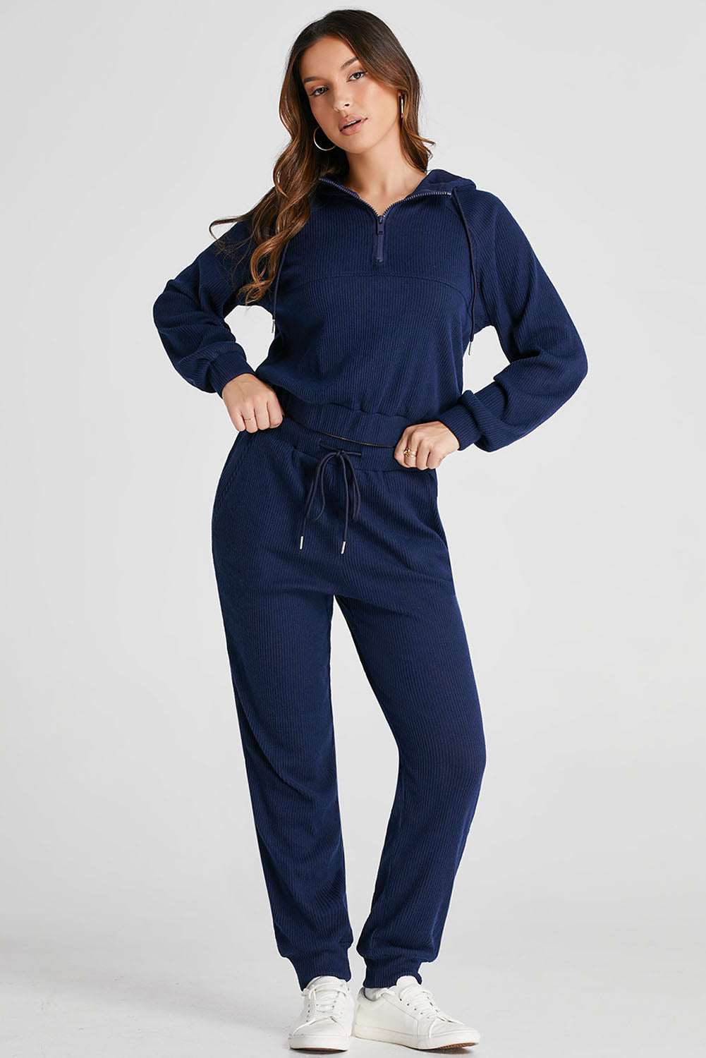 Drawstring Half Zip HoodieExpress Global Mart  Features: Drawstring
Number of pieces: Two-piece
Stretch: Slightly stretchy
Material composition: 95% polyester, 5% elastane
Care instructions: Machine wash cold. TuDrawstring Half Zip Hoodie and Joggers Active SetTrendsi