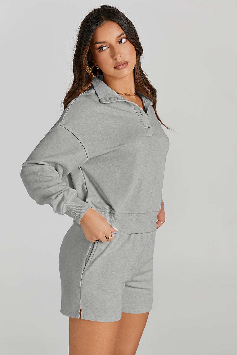 Half Button SweatshirtExpress Global Mart  Features: Pocketed
Number of pieces: Two-piece
Stretch: Slightly stretchy
Material composition: 65% polyester, 35% rayon
Care instructions: Machine wash cold. TumbleHalf Button Sweatshirt and Shorts Active SetTrendsi