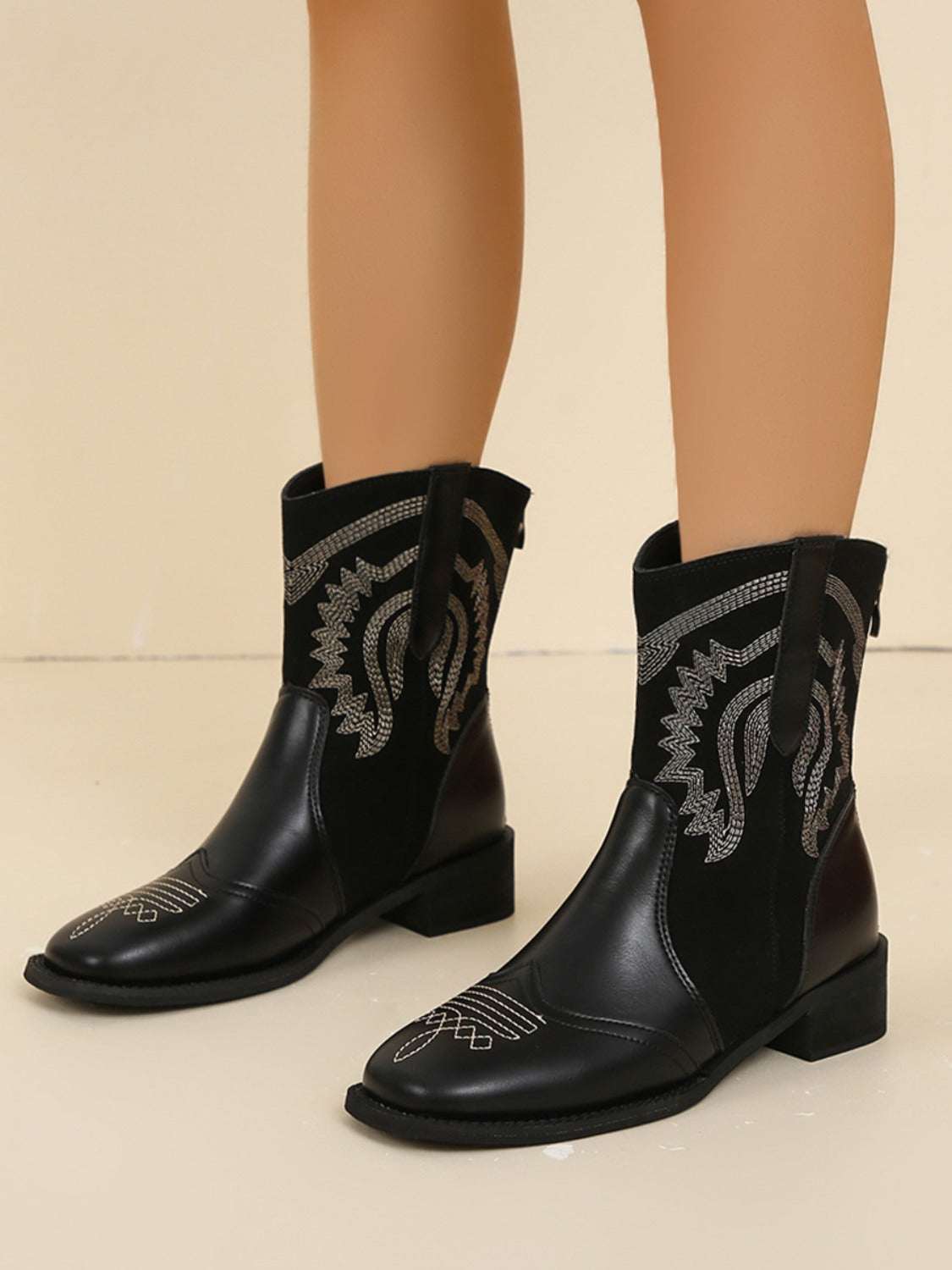 Embroidered PU Leather Block Heel BootsExpress Global Mart  Includes: Box not included
Heel height: Low heels
Material: Elastomer, PU
Imported


Size
Foot length


35(US4)
8.8


36(US5)
9


37(US6)
9.2


38(US7)
9.4


39(US8)Embroidered PU Leather Block Heel BootsTrendsi