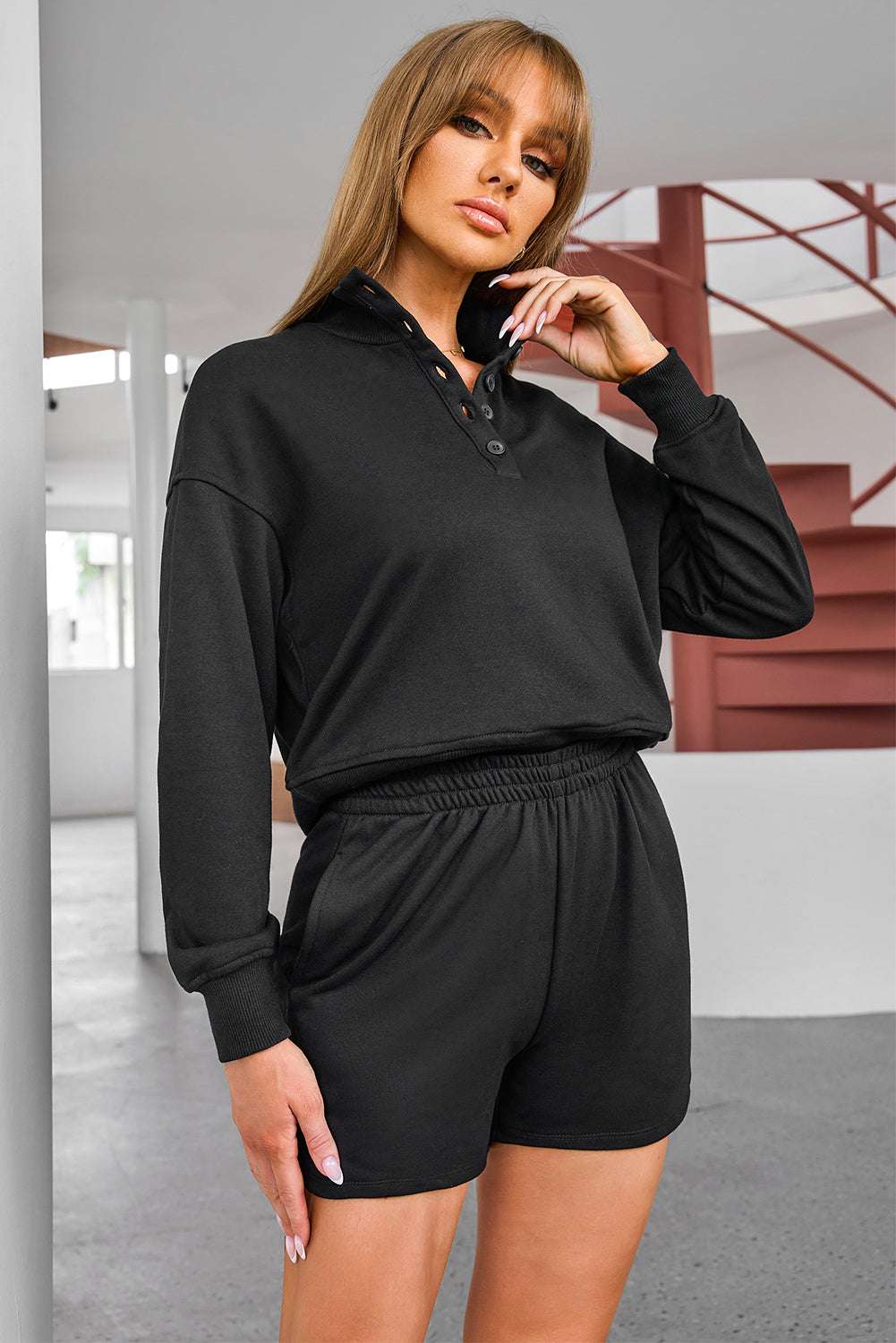 Half Button SweatshirtExpress Global Mart  Features: Pocketed
Number of pieces: Two-piece
Stretch: Slightly stretchy
Material composition: 65% polyester, 35% rayon
Care instructions: Machine wash cold. TumbleHalf Button Sweatshirt and Shorts Active SetTrendsi