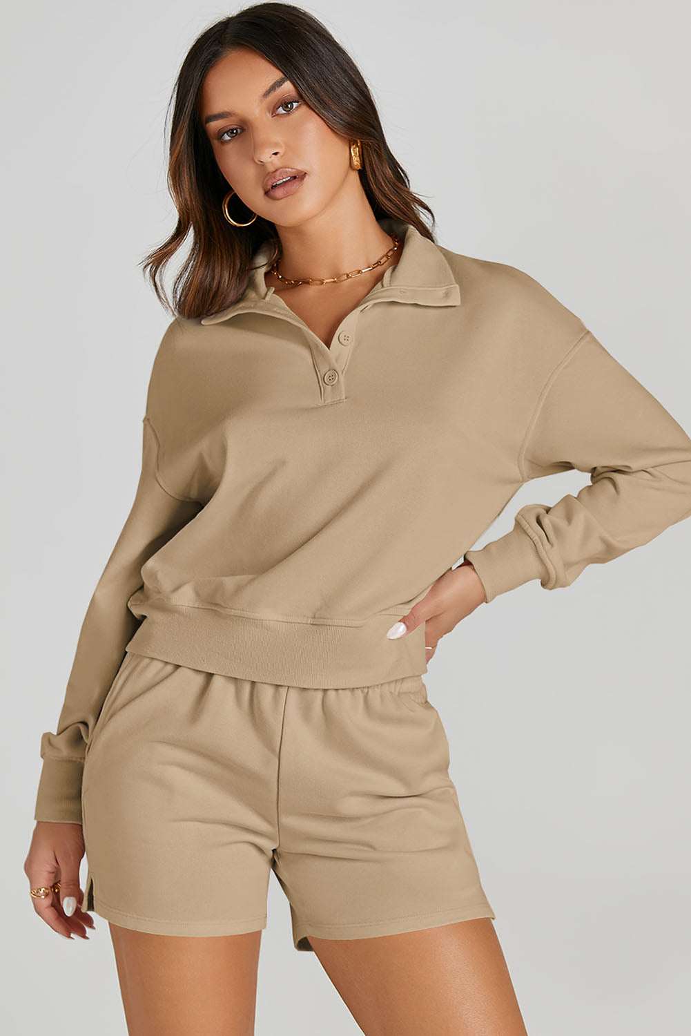 Half Button SweatshirtExpress Global Mart  Features: Pocketed
Number of pieces: Two-piece
Stretch: Slightly stretchy
Material composition: 65% polyester, 35% rayon
Care instructions: Machine wash cold. TumbleHalf Button Sweatshirt and Shorts Active SetTrendsi