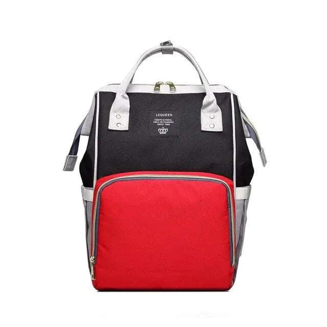 Fashionable black and red maternity nappy bag with spacious compartments and insulated pockets.