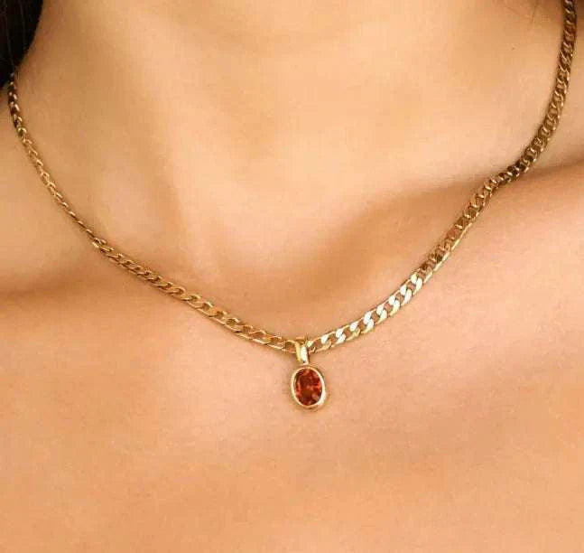 Crystal Stone Pendant Necklace with gold chain featuring an elegant amber crystal.